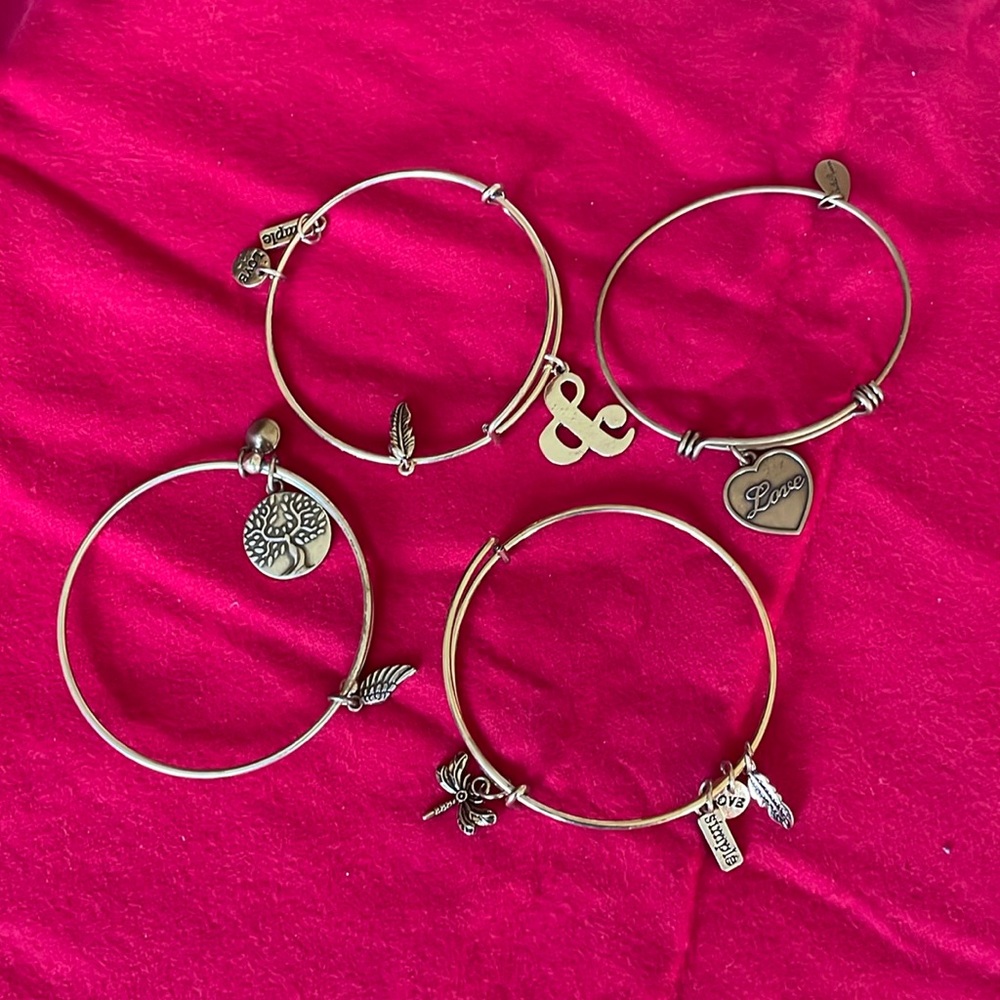 Lot of 4 bangles. Got as gifts. Not sure if Alex & Ani brand or other brand